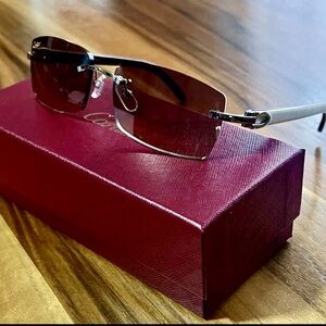 CARTIER C ALLONGÉ DE Sunglasses in silver with Buffalo horn arms.